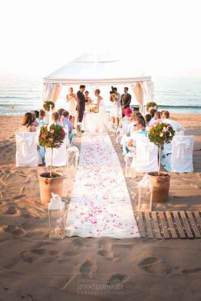 Photograph of a beach wedding under a tent at Anisaras Heraklion Crete